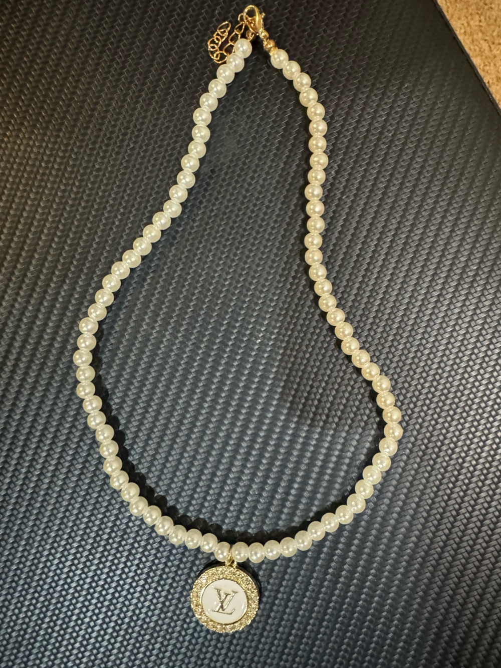 Elegant Ivory Pearl Necklace with Gold Accents